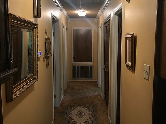 Hallway to the 3 bedrooms 