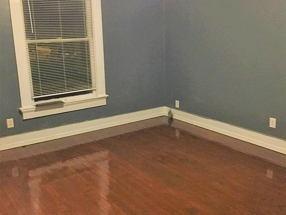 Living room with newly varnished hardwood floor