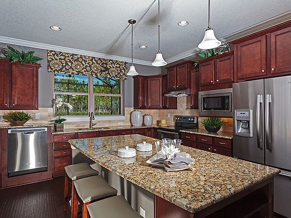 Kitchen with Granite Countertops and Island Barstool Seating