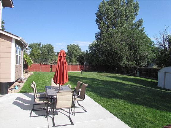 Spacious concrete patio and large backyard!