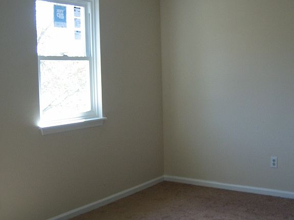 One of three bedrooms