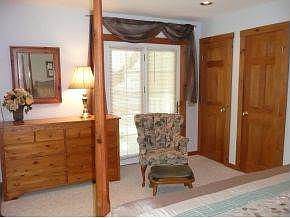 2 closets and door to porch