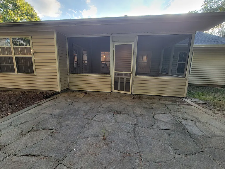 Patio that overlooks the sunroom