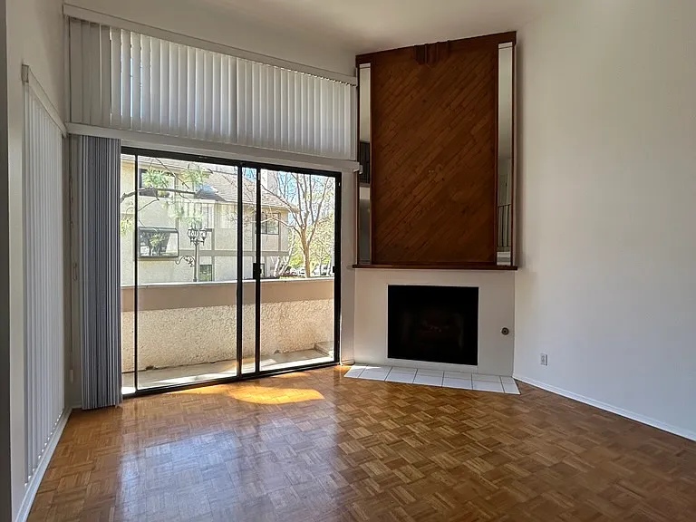Downstairs living area with patio door and outdoor access
