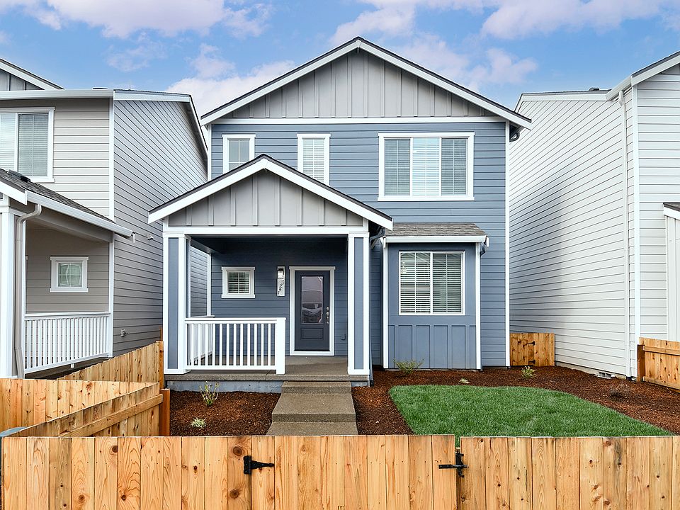 The Cayuse is a beautiful two story home with siding.