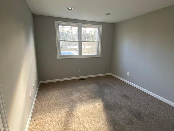 Master bedroom (picture is still showing old carpet)