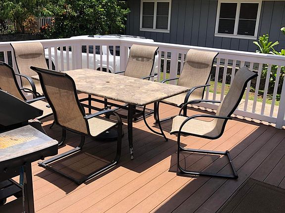 Easy to clean, well-maintained trex porch - great for dining outdoors.