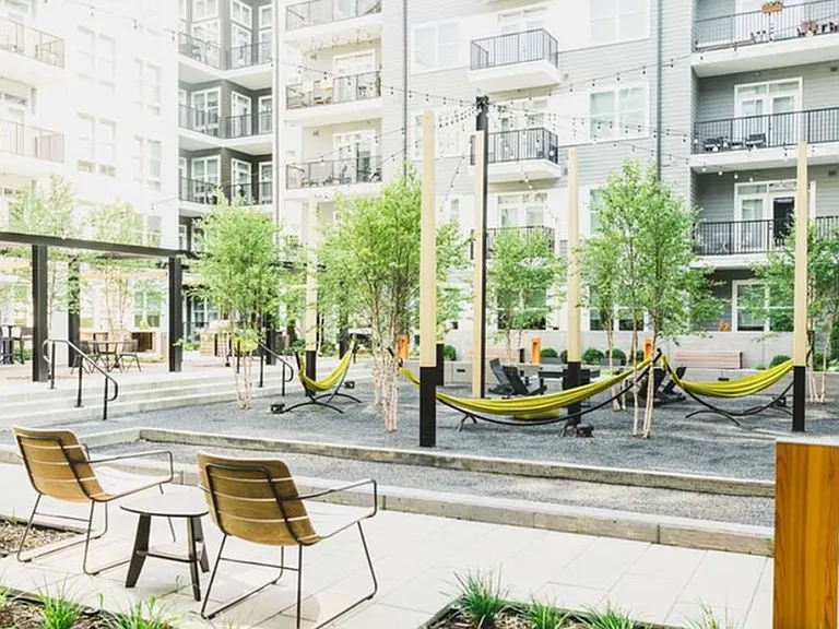 Watch the game in the courtyard, relax in a hammock or play some bocce ball on the built-in court