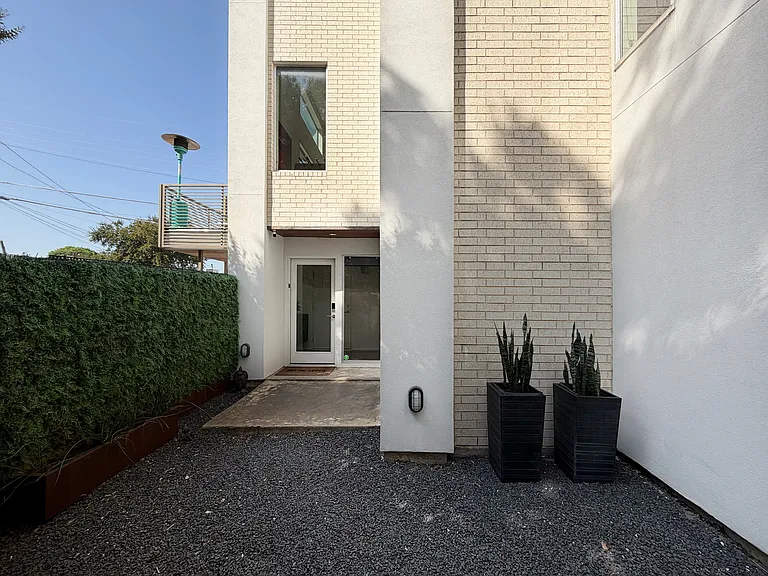 Enjoy everything Knox/Henderson has to offer in "The Urban Tree House," a single-family modern home on a private corner lot.