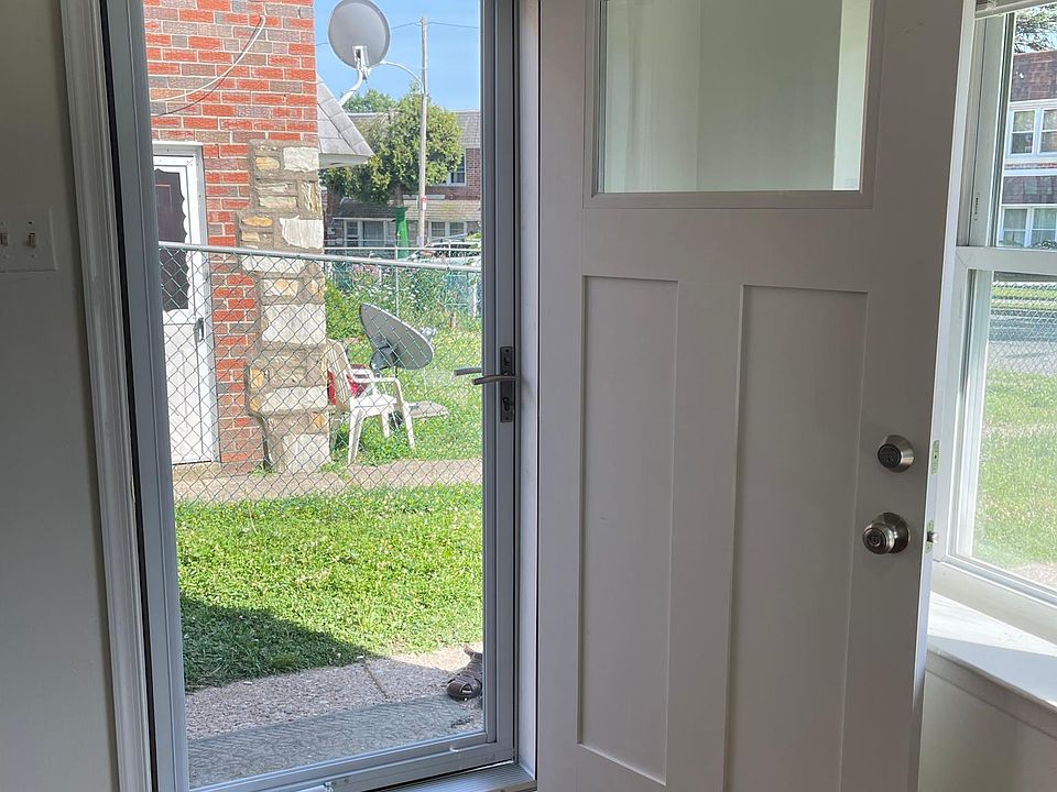 Brand new front door + exterior storm door.