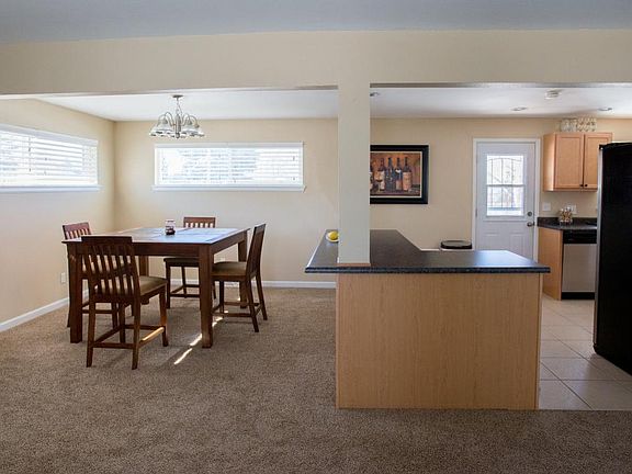 Dining room with open kitchen.