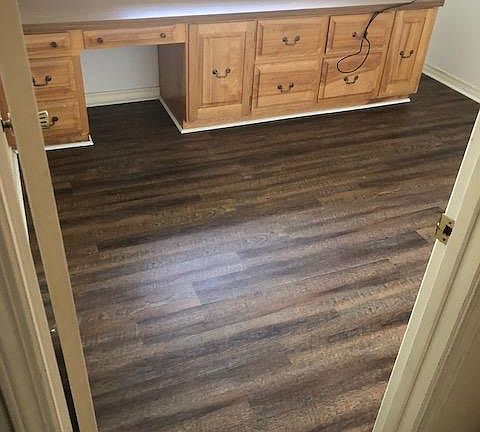 Bedroom with built-in desk.