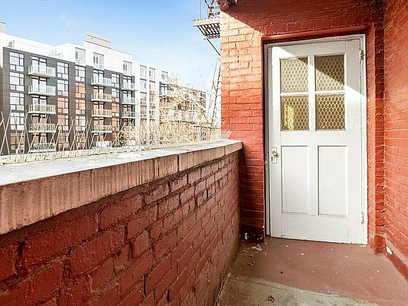 3rd image of 65-36 Wetherole St #311