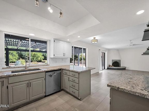 Open-concept kitchen and dining rooms.