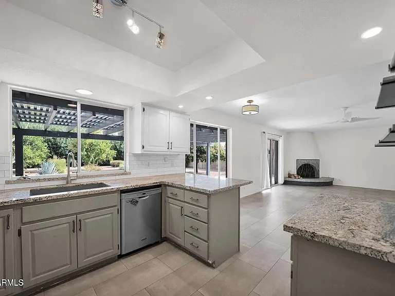 Open-concept kitchen and dining rooms.