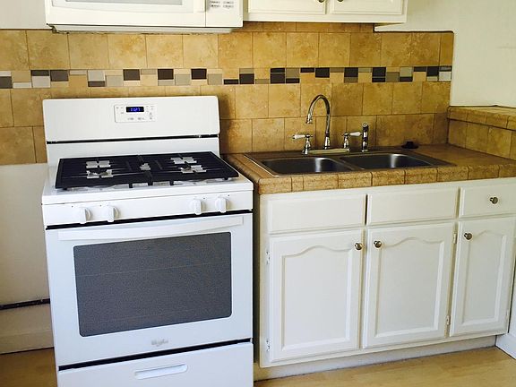 Gorgeous upgraded with Mediterranean tile full kitchen.