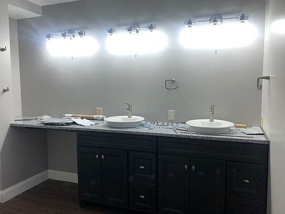 Owner_s bath with 3 mirrors (not shown) and double sinks