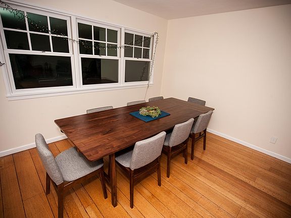 Dining Space. On the other side of the front living room is a dining space . Large enough for an 8-10 person table and right by the front window with great light