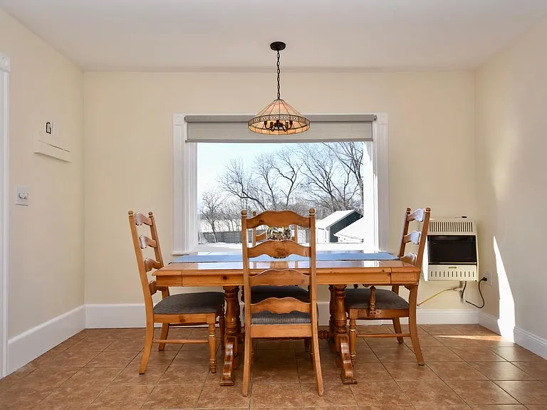Kitchen with large table overlooking the Payson Park and the Back Cove