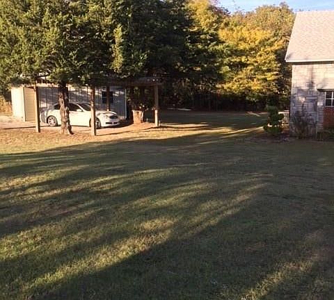Carport on side garage
