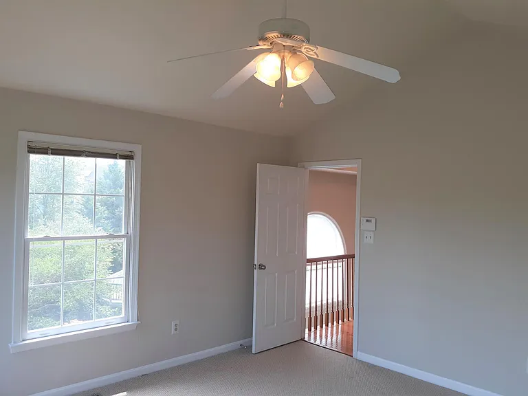 Master Bedroom with Vaulted Ceiling