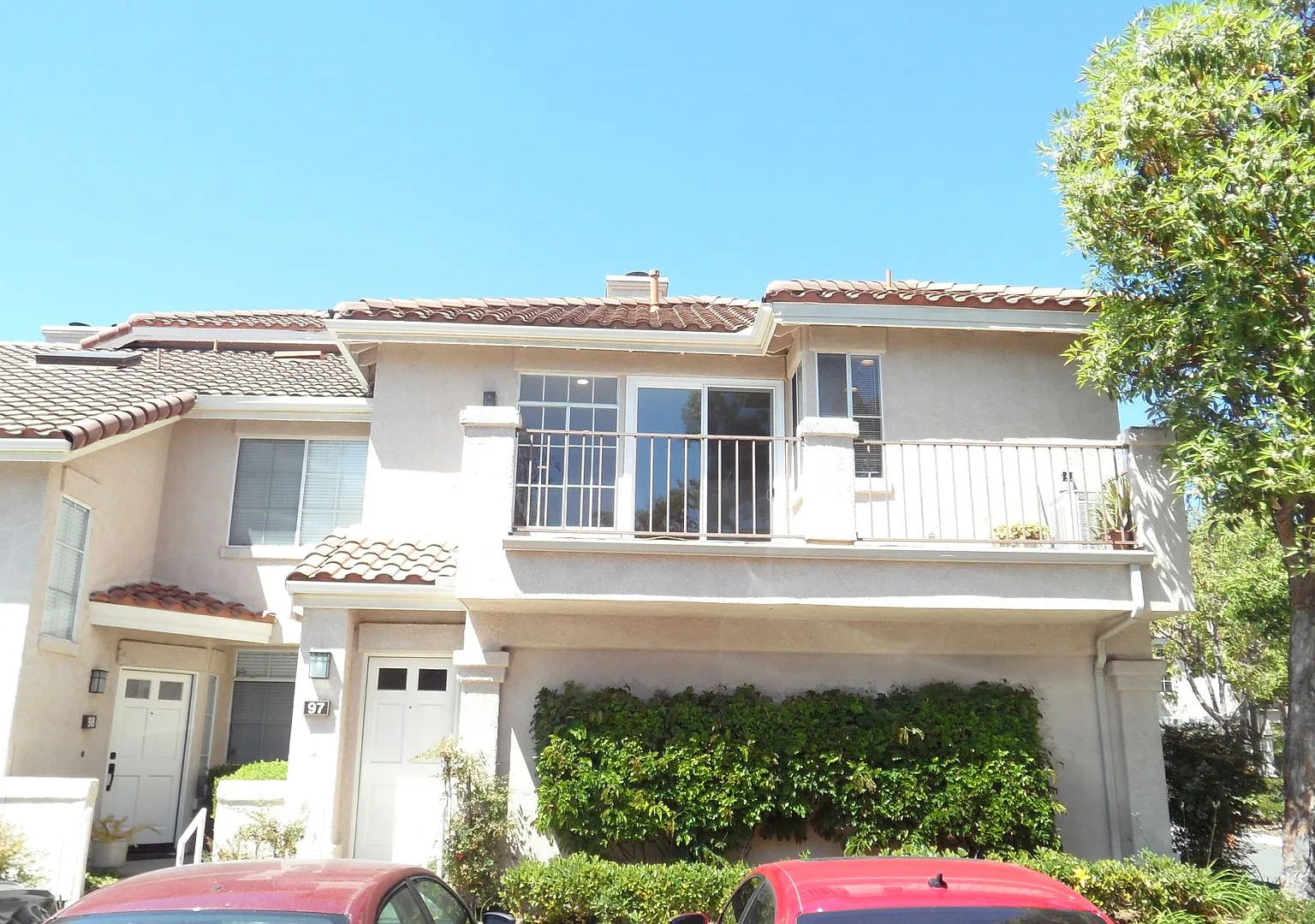 Upstairs 2BR; 2BA end-unit condo w/ 1 car attached garage — Photo 1