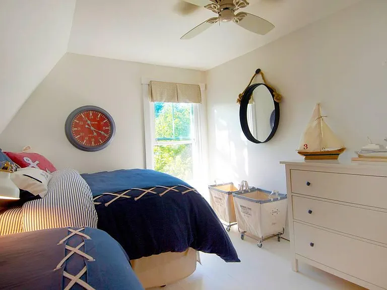 Nautical themed 3rd bedroom features a Double bed and a twin bed. Twin can be removed for longer leases, if desired and room can be rearranged to have double bed on full-height wall.