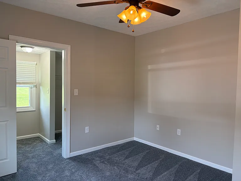 Bedroom 1 with closet and additional oversized multi-purpose space