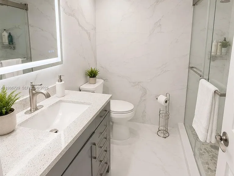 299 NW 52nd Ter #X — Photo 8