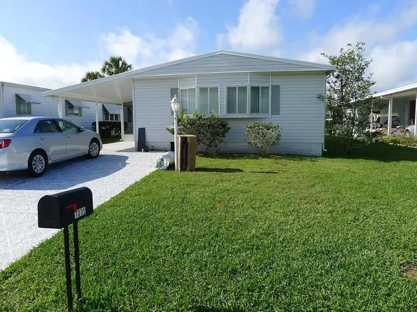 1035 Royal Palm Dr, Barefoot Bay, FL 32976
