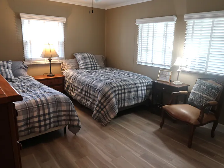 2 full beds in bedroom