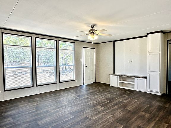 Living Room facing the wooded back
