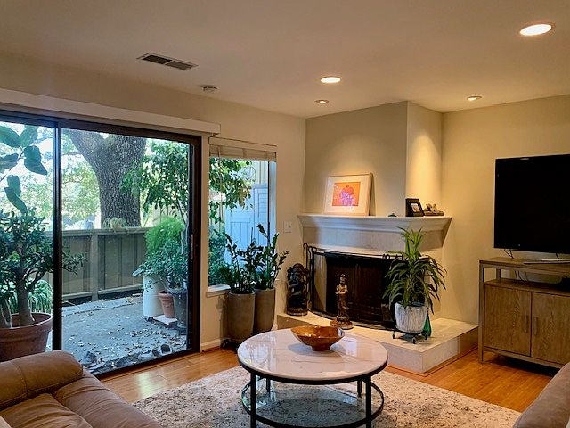 Living room with corner fireplace