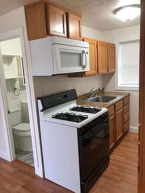 Bright kitchen with good cabinet space.