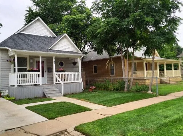 Only two houses on this side of the block owned by the same owner