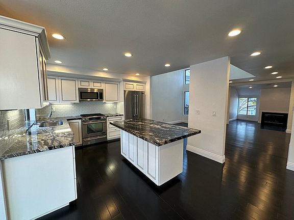 Kitchen, Foyer & Living Room