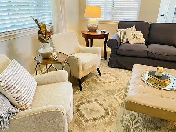 Living Room with sofa and chairs! Great space for enjoying your time in Sun City