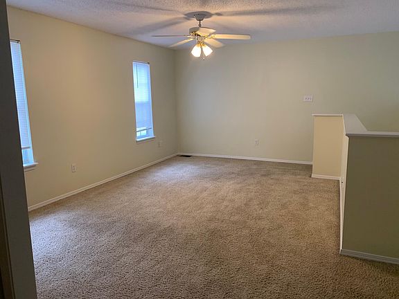 Large master suit with a vanity area walk in closet and bathroom