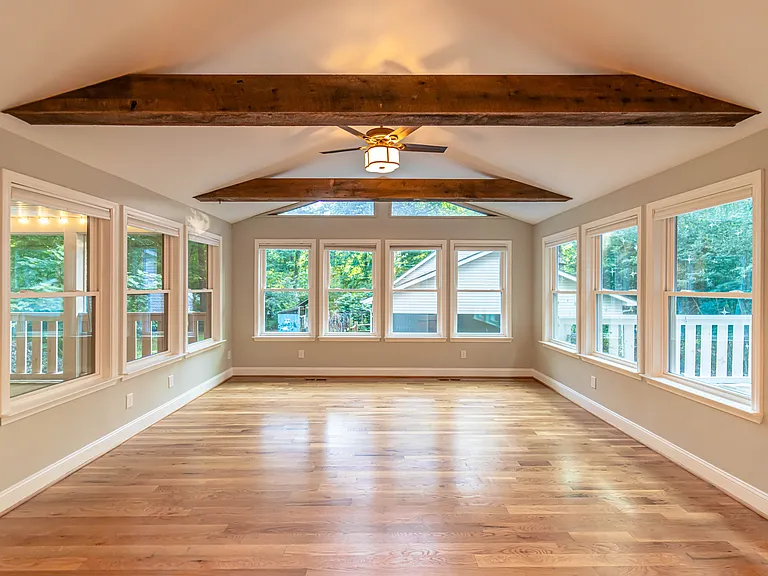 Sunroom, custom reclaimed wood beams.