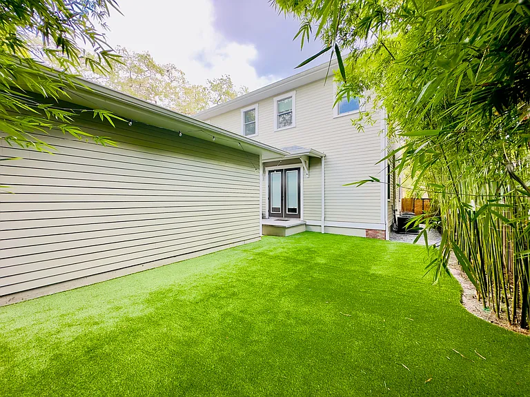 Brand new Astroturf through backyard