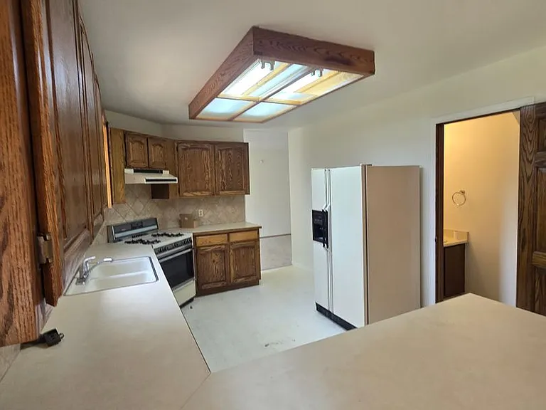 3409 E 99th Dr — Photo 3