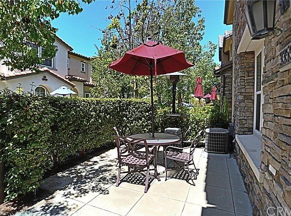 Patio area with privacy landscaping