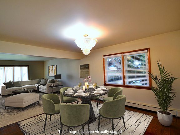 Formal Dining room virtually staged to give you an idea how it looks with furniture in it.
