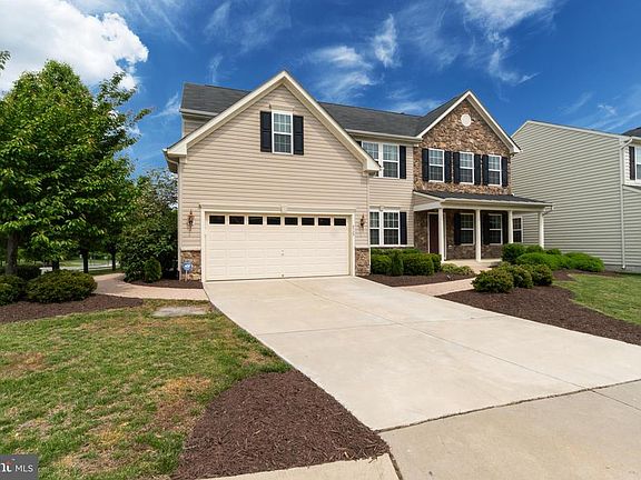 Stone and Vinyl with Front Porch