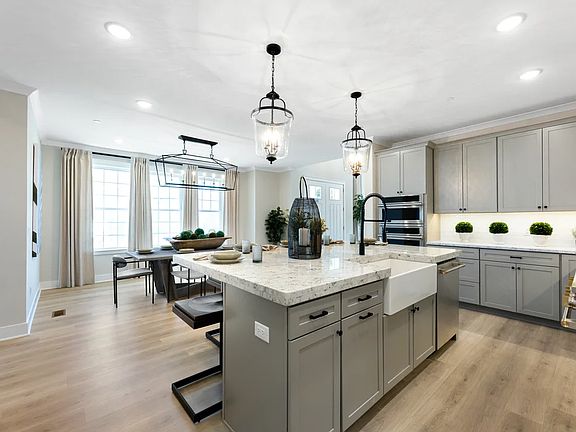 Kitchen with pendant lighting over island