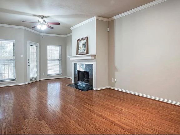 Living Room with Fireplace and abundant natural light