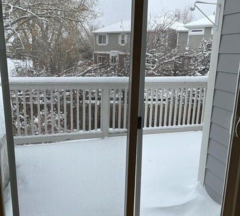 Door out to upper-level patio and garden area