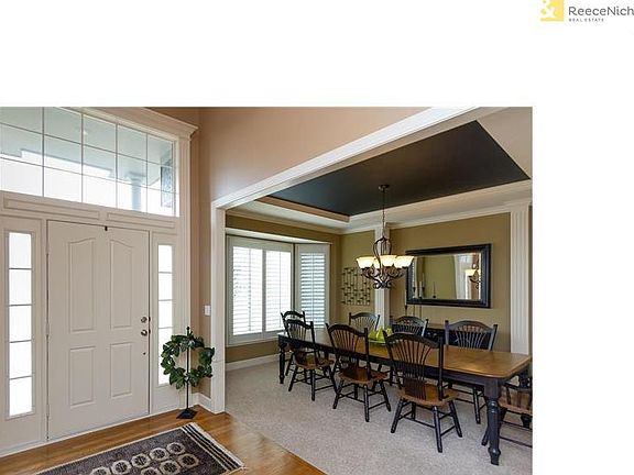2-story entry is flooded with natural light.