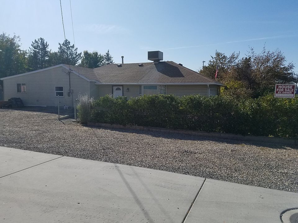 Front view. Park 8 cars and an RV