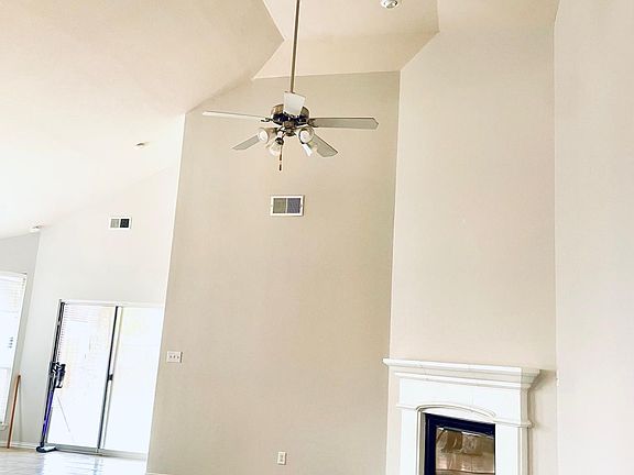 Vaulted ceilings give a spacious and airy feel to the living area!